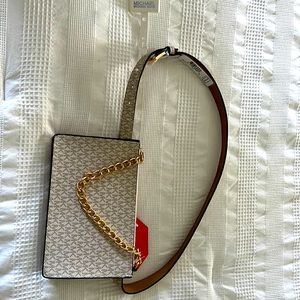Brand new Michael Kors belt bag. Never used. Medium